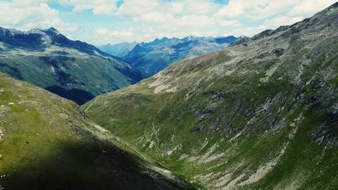Mountains, clouds and green trees with Rivers Stock Photos