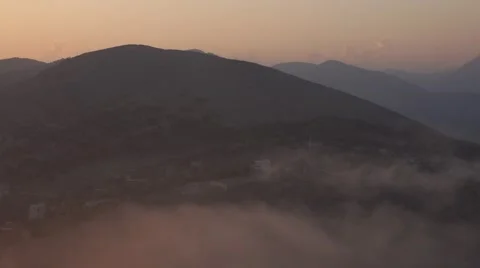 The mountains, the clouds go fast, on a background of mountains Video stock 67421892