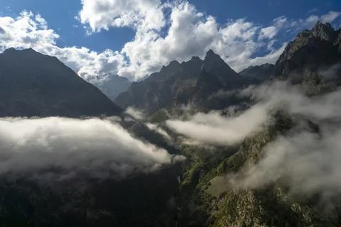 Mountains in the clouds. Low clouds in the North Caucasus mountains Stock Photos