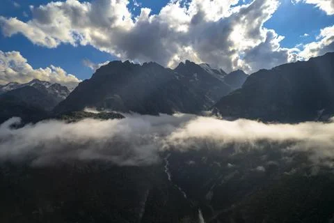 Mountains in the clouds. Low clouds in the North Caucasus mountains Stock Photos