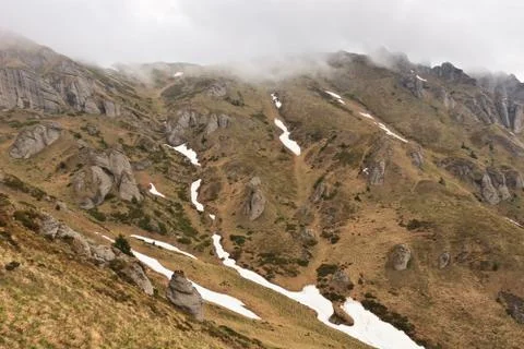 Mountains in clouds Stock Photos
