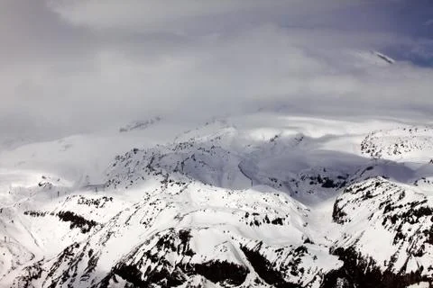 Mountains in clouds Stock Photos