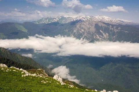 Mountains with clouds Stock Photos
