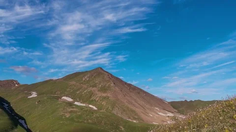 Mountains Clouds Sunrise Flowers Time Lapse Panorama 4k Stock Footage