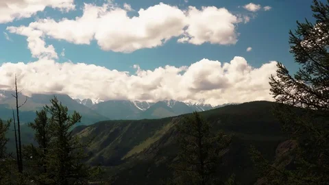 Mountains in clouds timelapse Altay Stock Footage 106360089