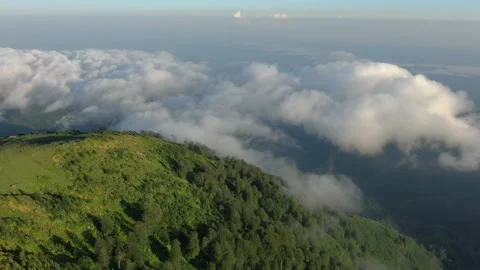 Mountains in clouds, View from drone above clouds of mountain village Video stock 237611519