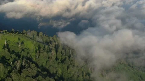 Mountains in clouds, View from drone above clouds of mountain village Vídeo Stock 237611596