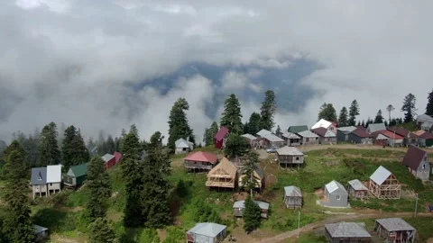 Mountains in clouds, View from drone above clouds of mountain village 库存影片 237613126