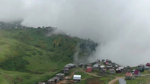 Mountains in clouds, View from drone above clouds of mountain village Vidéo 237613473
