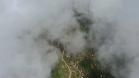Mountains in clouds, View from drone above clouds of mountain village Vidéo 237613582