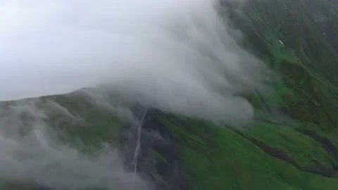 Mountains in clouds, View from drone above clouds of mountain village 库存影片 237774610