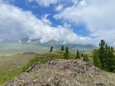 Mountains in cloudy weather. Variable weather in the mountains. 스톡 사진