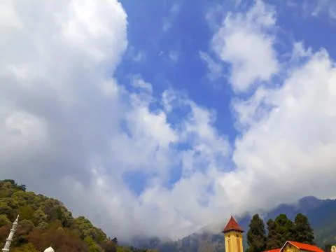 Mountains covered by clouds Stock Photos