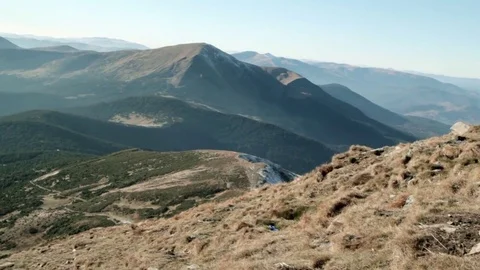 Mountains covered with forests and grass. The Carpathians. Autumn sunny day Video stock 73903156