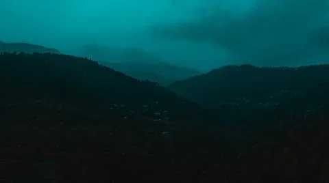 Mountains covered with trees under blue sky Stock Photos