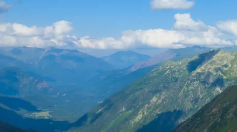 Mountains in dense clouds time lapse Stock Footage 37069336
