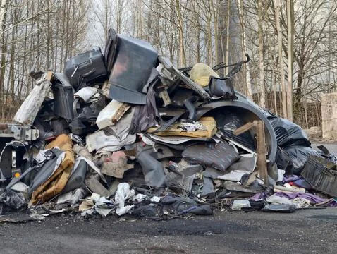 Mountains of discarded materials and refuse deteriorate landscape and harm .. Stock Photos