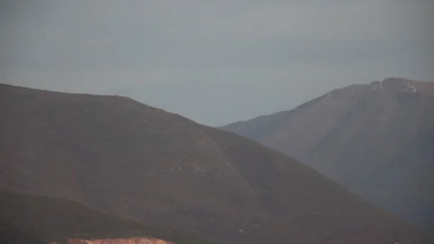 Mountains in the distance Stock Footage 147549603