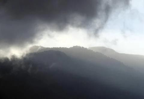  mountains with dramatic storm clouds with shadows in tenerife mountains w... Foto stock