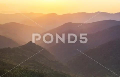 Mountains during sunrise. Beautiful natural landscape at the summer time Stock Photos