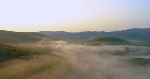 Mountains in a fog clouds Stock Footage 102896619
