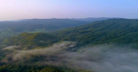 Mountains in a fog clouds Stock Footage 102897470