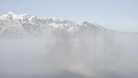 Mountains in the fog Stock Footage 264816350