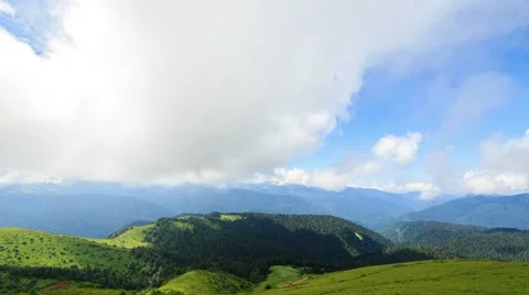 Mountains with forest and clouds. Time Lapse. Sochi, Russia. 1280x720 Vídeo Stock 53744472