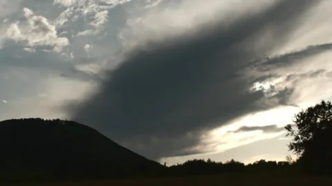 Mountains forest landscape under evening amazing epic cloudy sky in sunlight Stock Footage 279325288