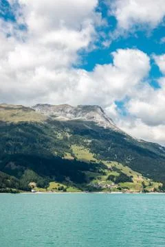 The mountains, green fields, meadows and forests near by the lake Stockfoto's