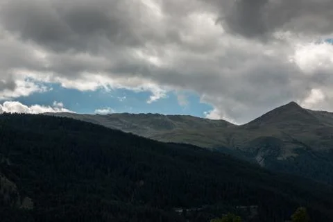 The mountains, green fields, meadows and forests Stock Photos
