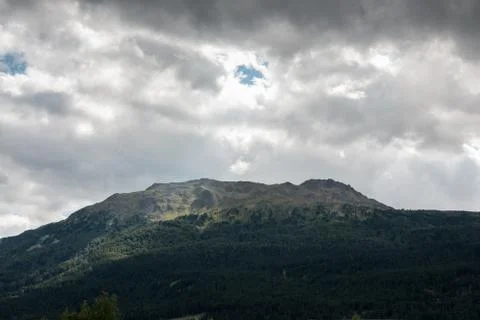 The mountains, green fields, meadows and forests Stock Photos