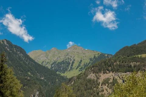The mountains, green fields, meadows and forests Stock Photos
