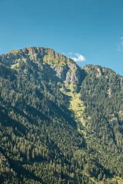 The mountains, green fields, meadows and forests Stock Photos
