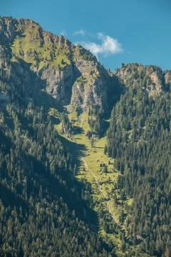 The mountains, green fields, meadows and forests Stock Photos