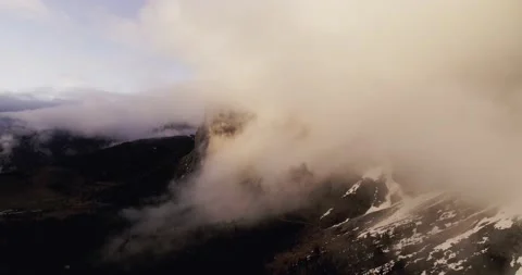 Mountains hidden in the clouds, aerial view of Sella in the Dolomites Stock Footage 132110683