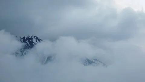 Mountains hiding in the clouds Stock Footage 102123293