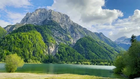 Mountains, Lake and Cloud Timelapse. Lago del Predil, Udine, Italy Video stock 329110238