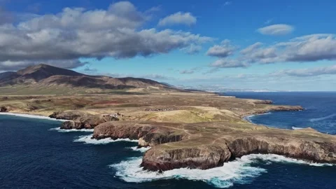 Mountains in Lanzarote, Spain with clouds and blue sky in the background Video stock 331801381