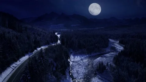Mountains at magical winter night big shining moon. Aerial view Stock Footage 218905535