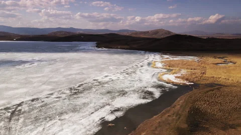 Mountains with melting snow and lakes with melting ice. Stock Footage 152720153