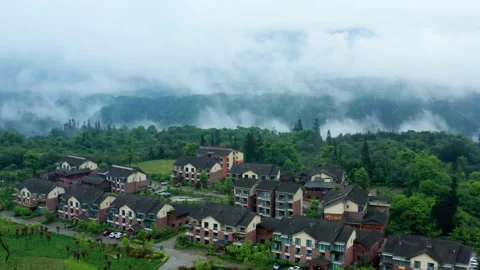 The Mountains In Middle Small Town Clouds Vídeos de archivo 164460259
