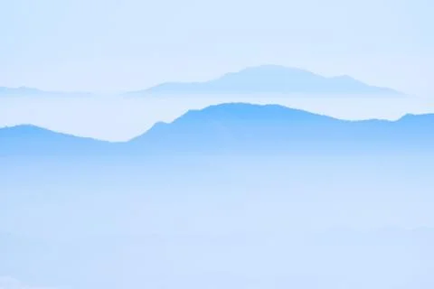 Mountains in the mist Stock Photos