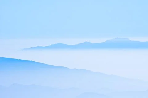 Mountains in the mist Stock Photos