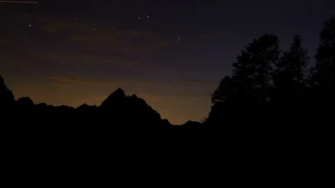 At the mountains in the night time lapse Stock Footage 101749537