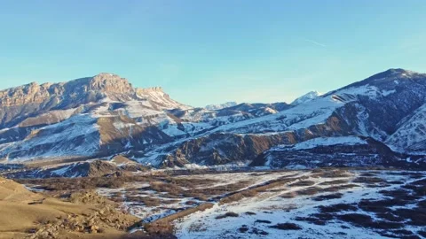 Mountains of the North Caucasus in the sky the plane flies Stock Footage 168980239