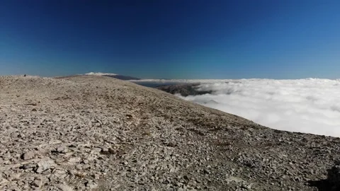 Mountains over sea of clouds 4K 18 Stock Footage 230958882