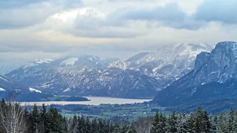 Mountains panorama with winter forest and blue sky. Time lapse Stock Footage 85490202