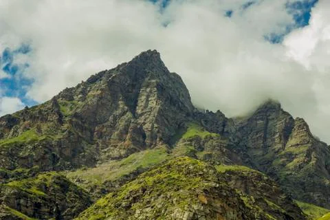 Mountains peak in the clouds Foto stock