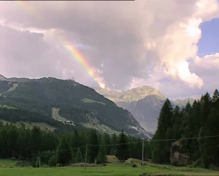MOUNTAINS with raimbow zoom Video stock 12407201